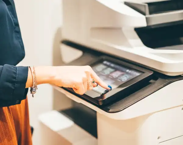 Someone using a photocopier