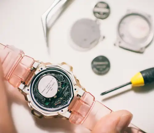 Someone repairing a watch